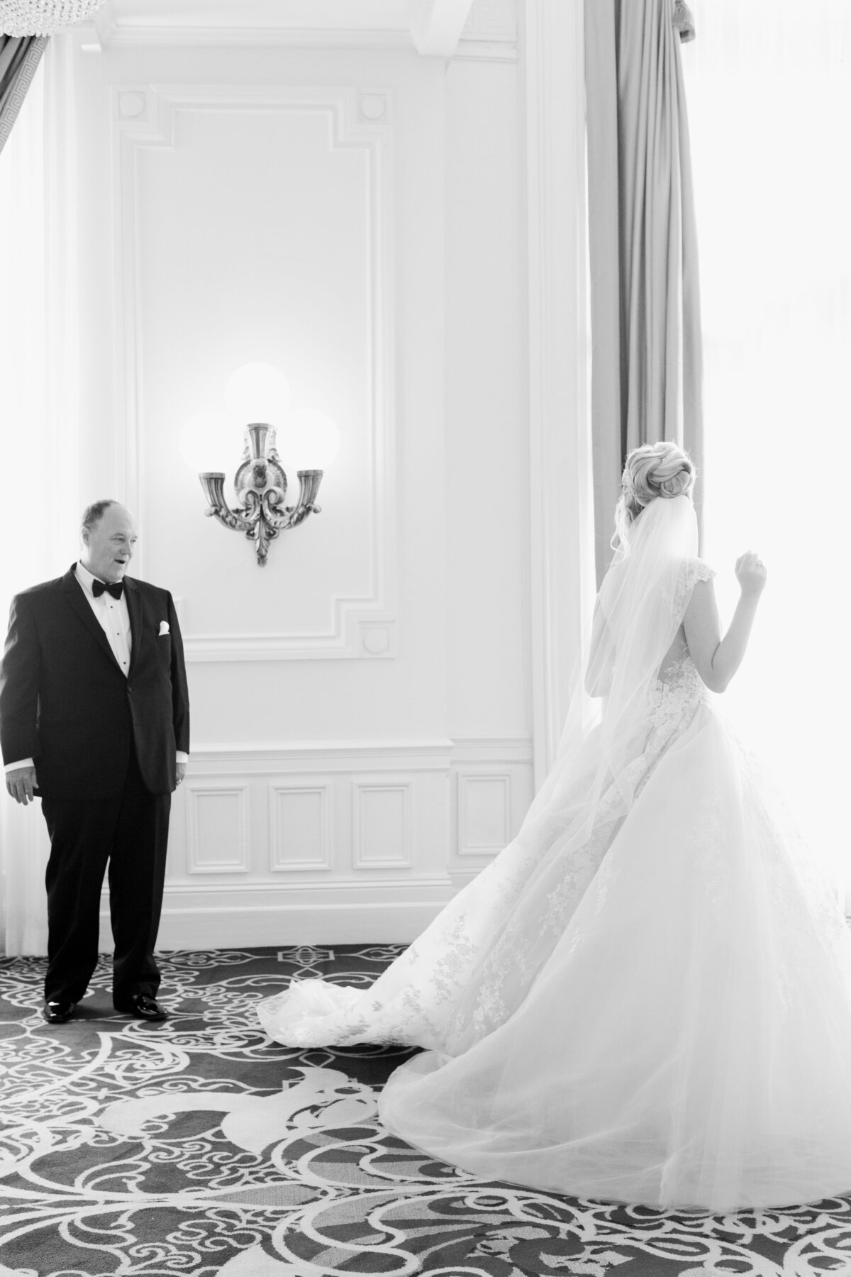 Father and daughter wedding first look