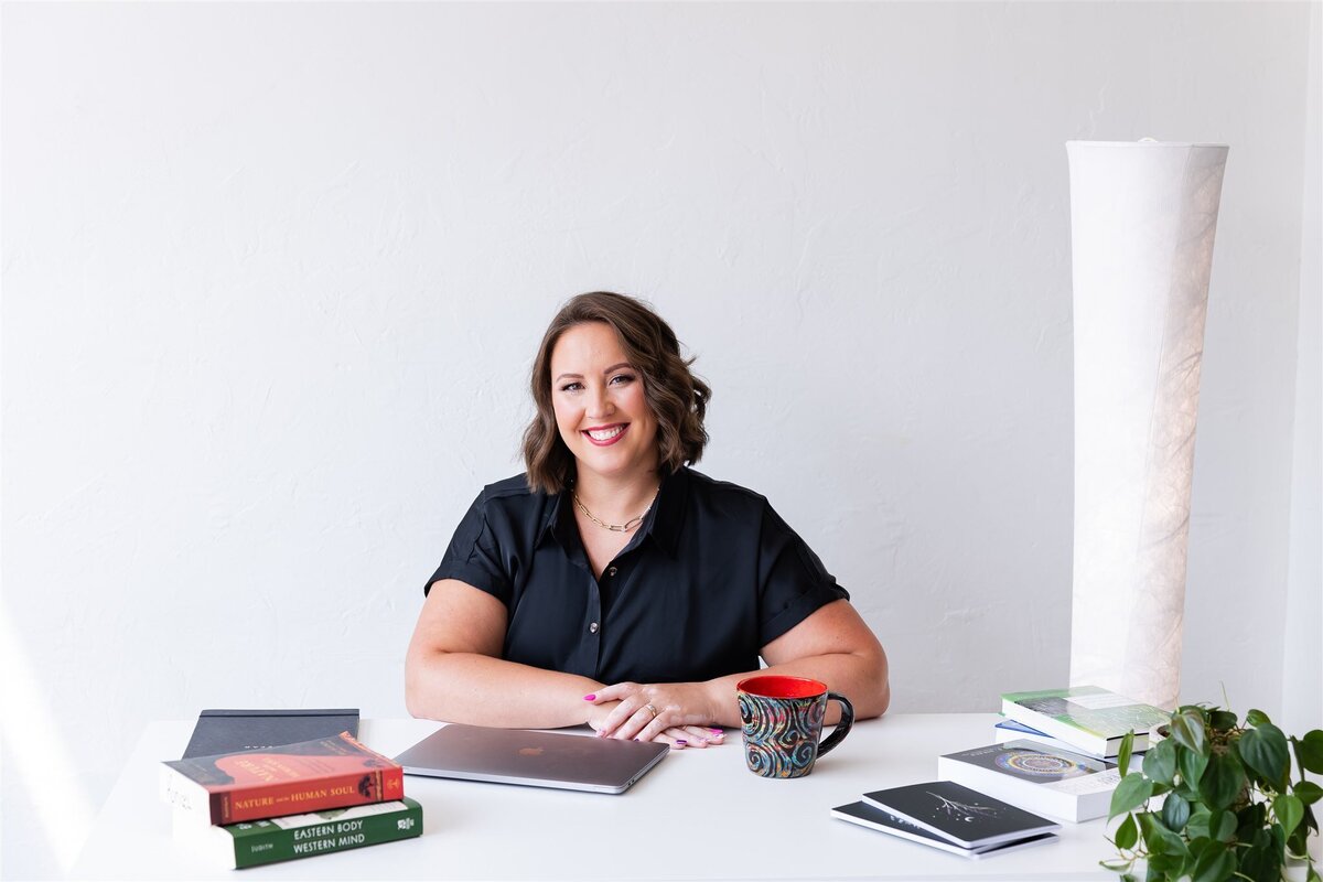 Kathryn Konicek working on a seminar for a martial arts gym