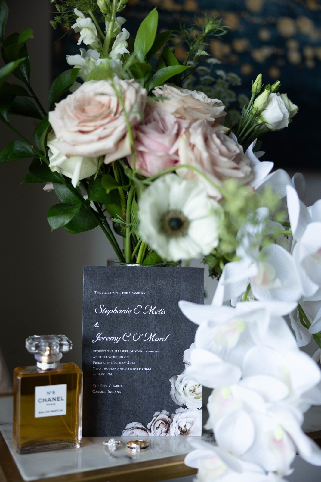 wedding-details-flatlay-invitation-chanel-perfume