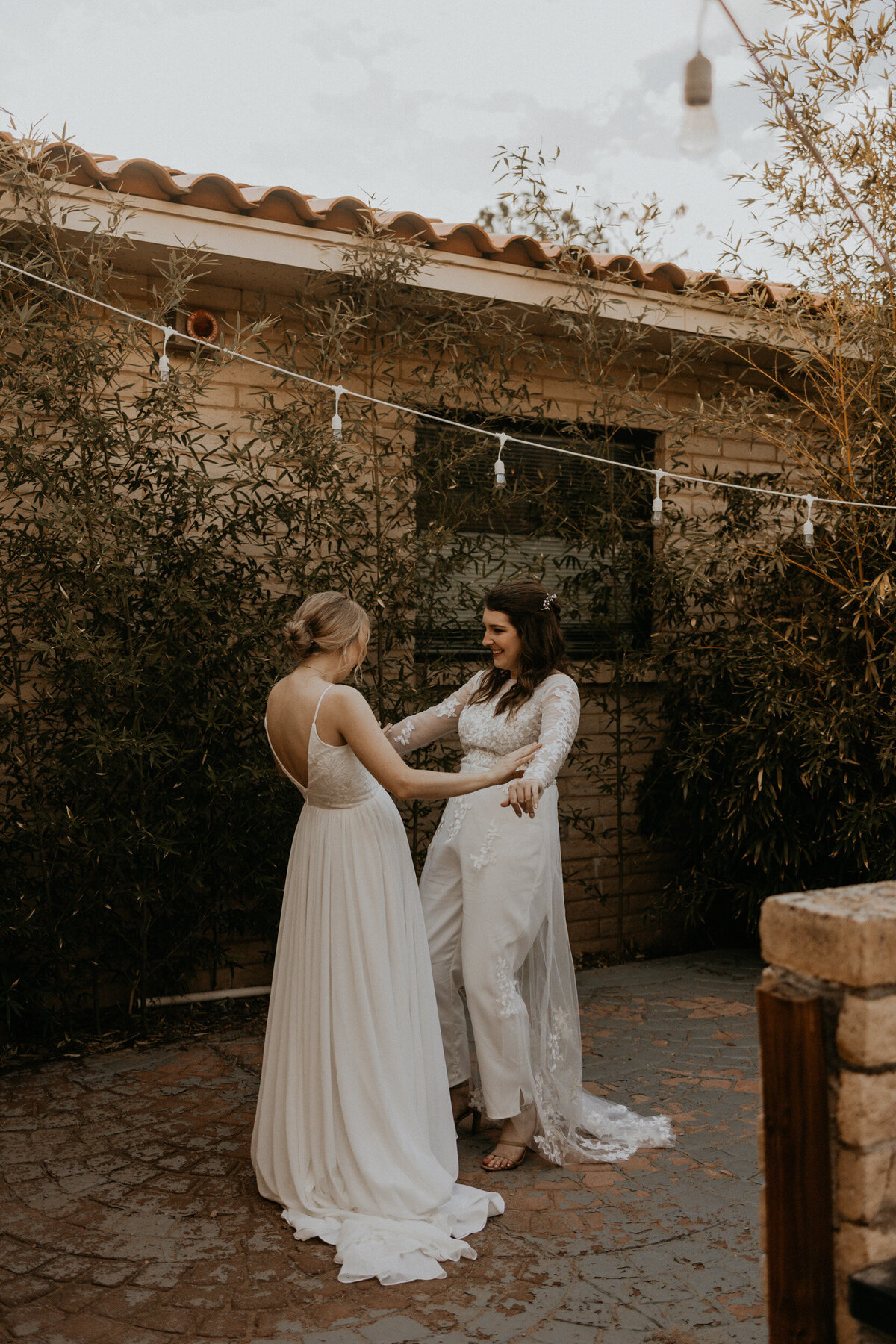 two brides first look before their ceremony, seeing each other for the first time