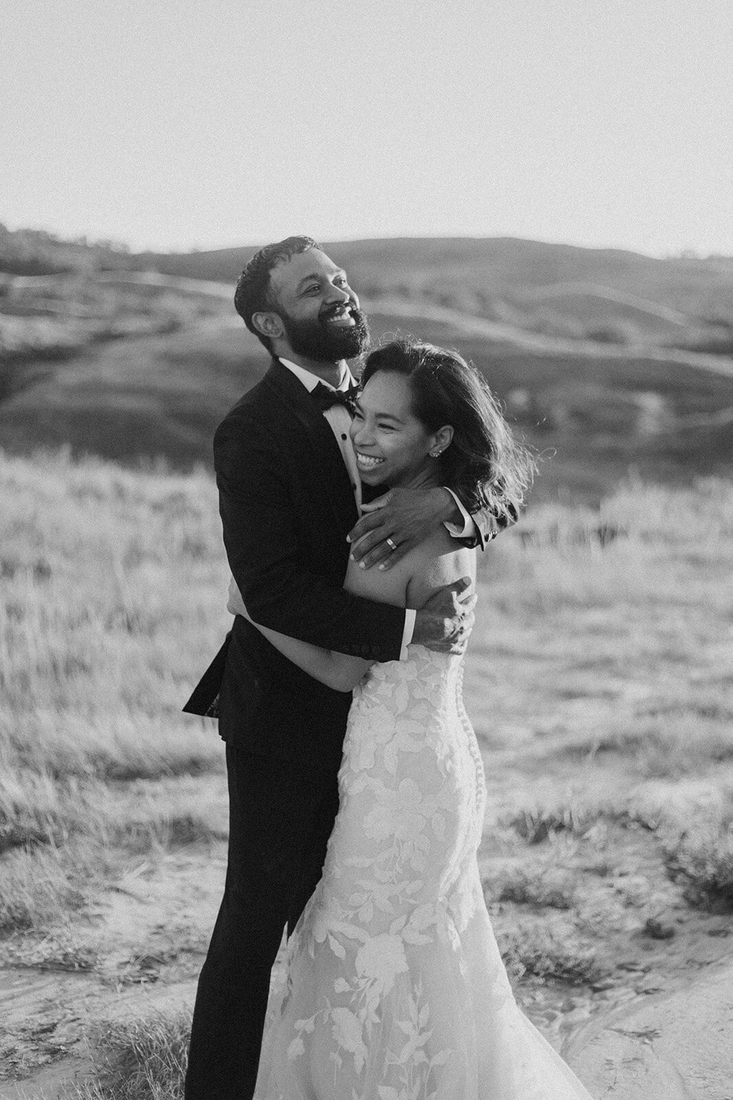 A couple embraces on their wedding day in Saskatchewan