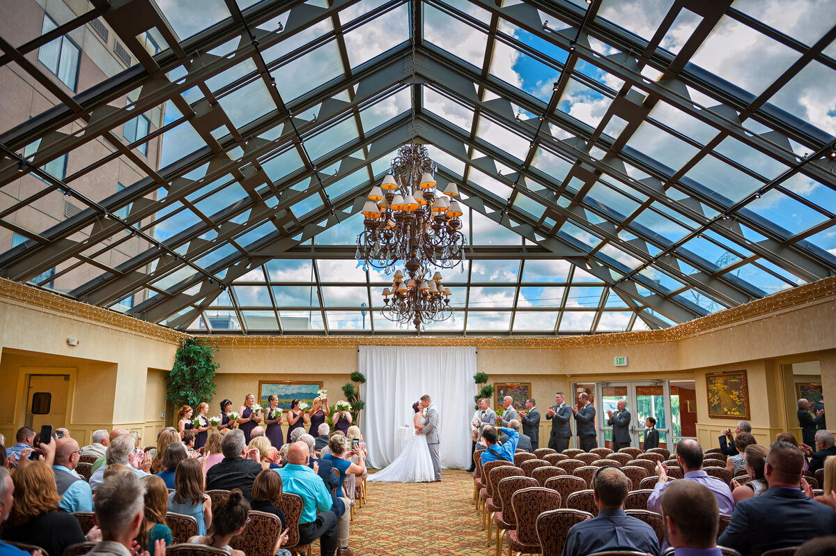Wedding ceremony at Ambassador Atrium in Erie PA.