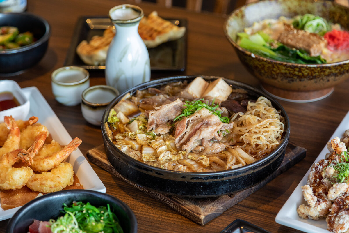 Izakaya Genbe pork pho bowl, tempura shrimp, and sake