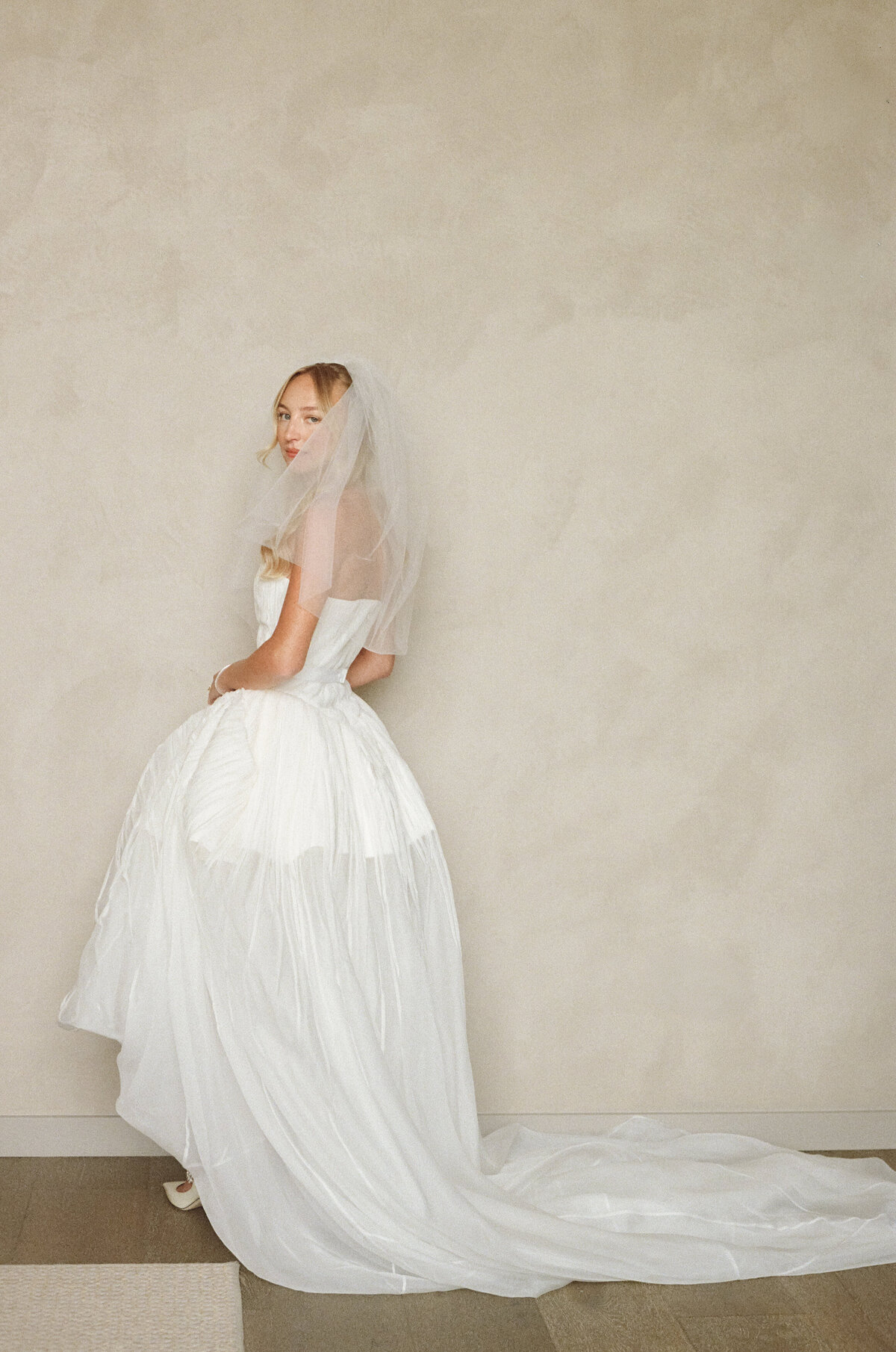 Sophisticated editorial wedding photography at NOBU Hotel Chicago featuring Lauren Alatriste's luxury wedding approach, combining fashion forward styling with film photography creating magazine-worthy imagery with authentic preparation
emotion.