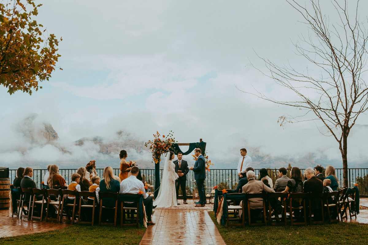 rainy wedding ceremony at sky ranch lodge in sedona