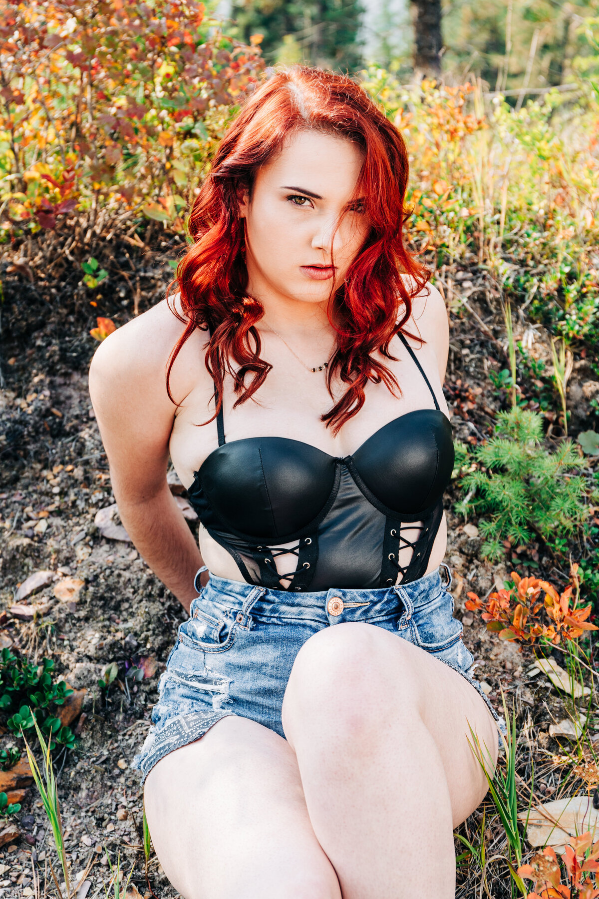 Outdoor boudoir photo woman in lingerie with red hair in Pattee Canyon, Missoula