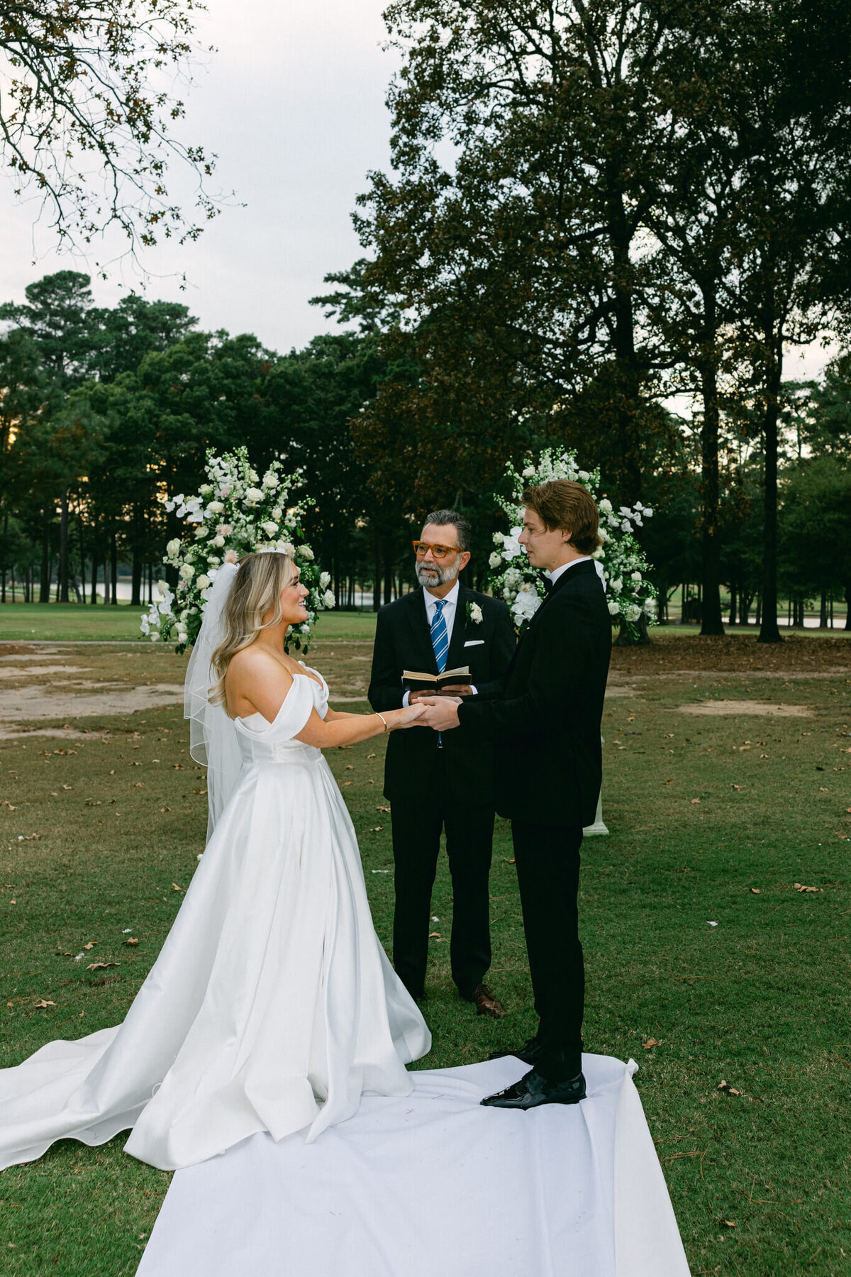 A wedding photo of the bride and groom during the ceremony