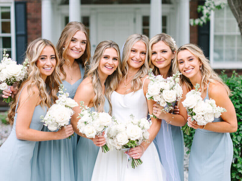 Bridesmaids smiling by wedding planners chicago