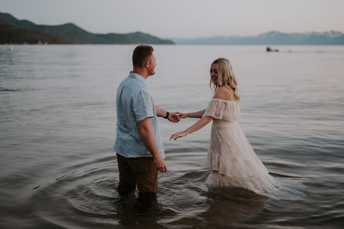 a couple posing for the camera in lake tahoe and proposal photographer in lake tahoe photographer in lake tahoe