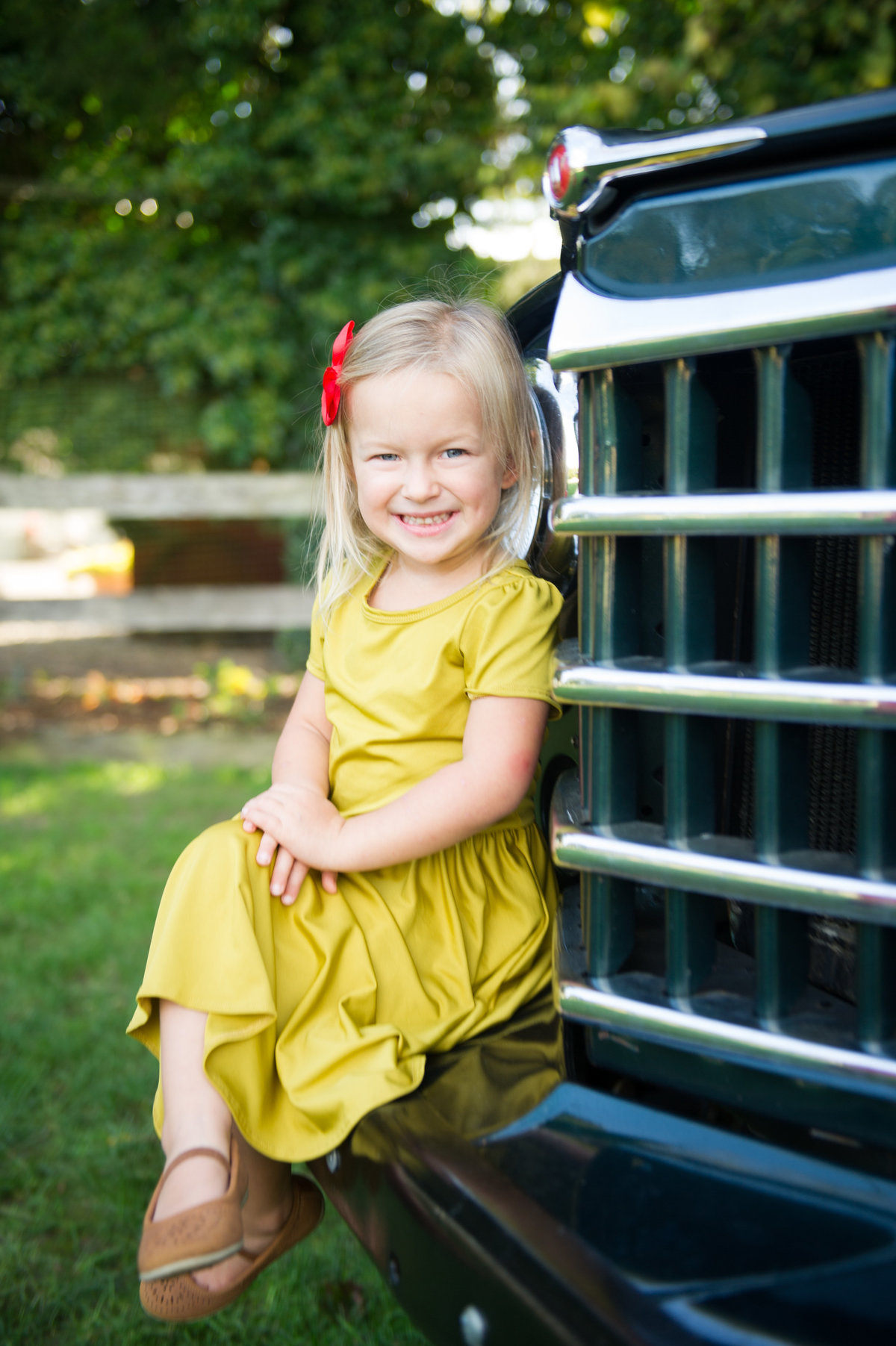 little girl and classic truck