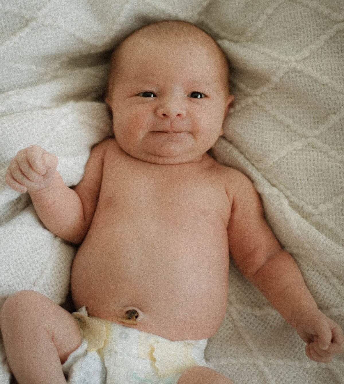 Solo baby portrait captured in soft light during a Temecula newborn session.