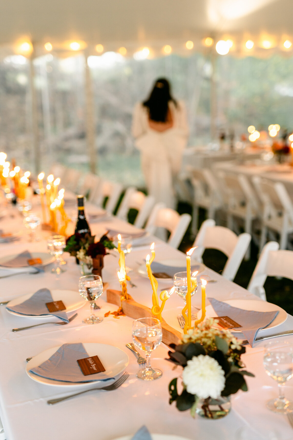 Wedding tablescape with wavy yellow candles