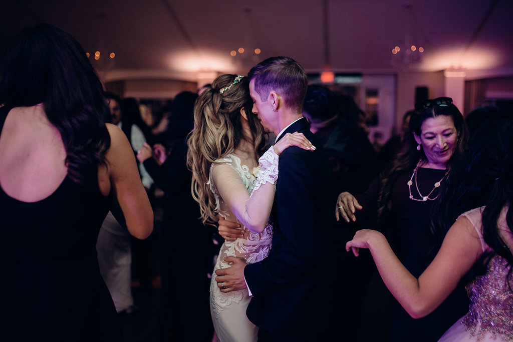 Wedding Photograph Of Bride And Groom Dancing In The Middle Of The Crowd Los Angeles