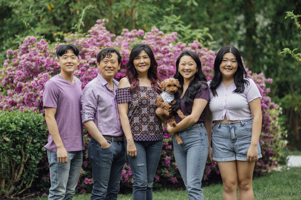 Family Photographer | Family smiling together during summer portrait session at Sayen Gardens | Hamilton, New Jersey