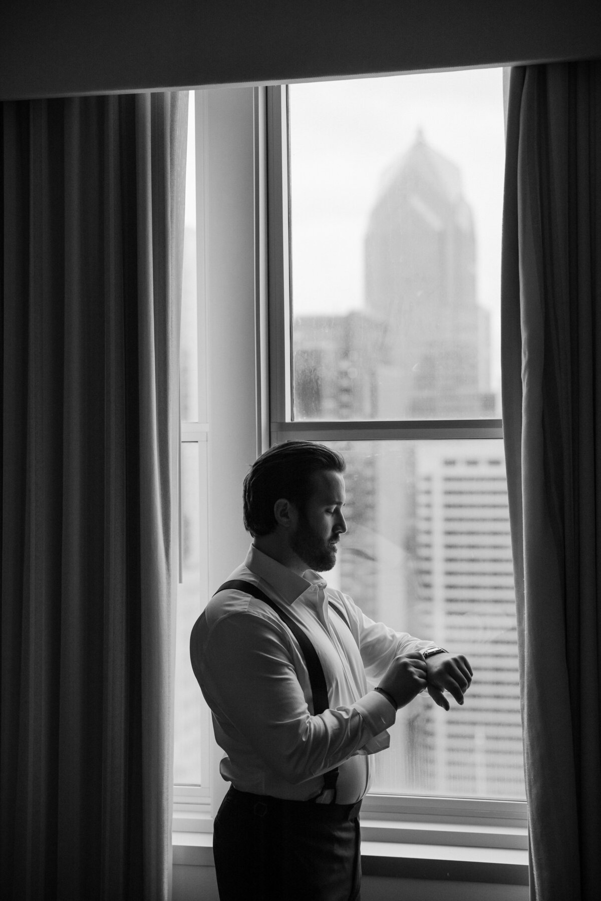 groom getting ready at the loews hotel  in philly