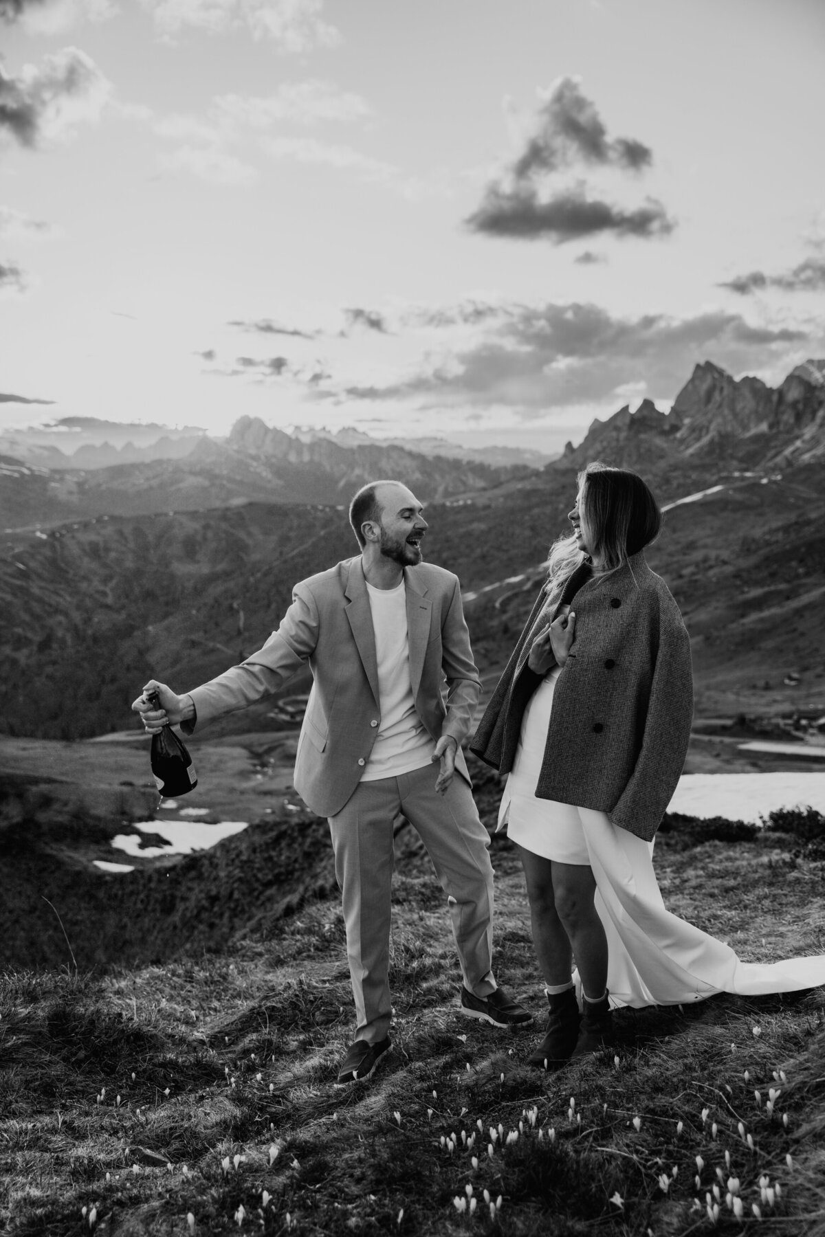 romantic couple during twilight elopement in Dolomites