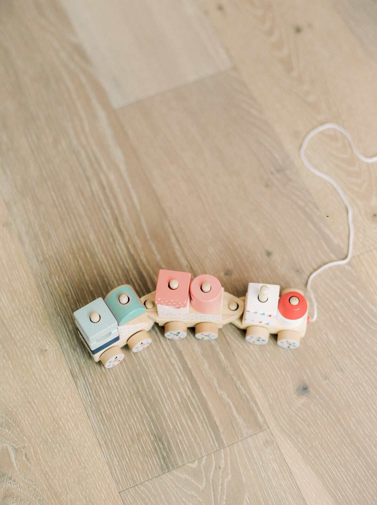 Baby Train on Wood Floor