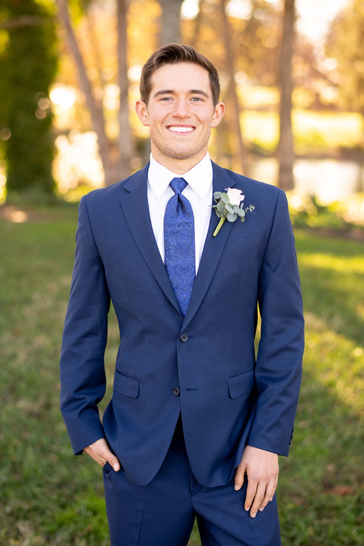 portrait of groom at wedding