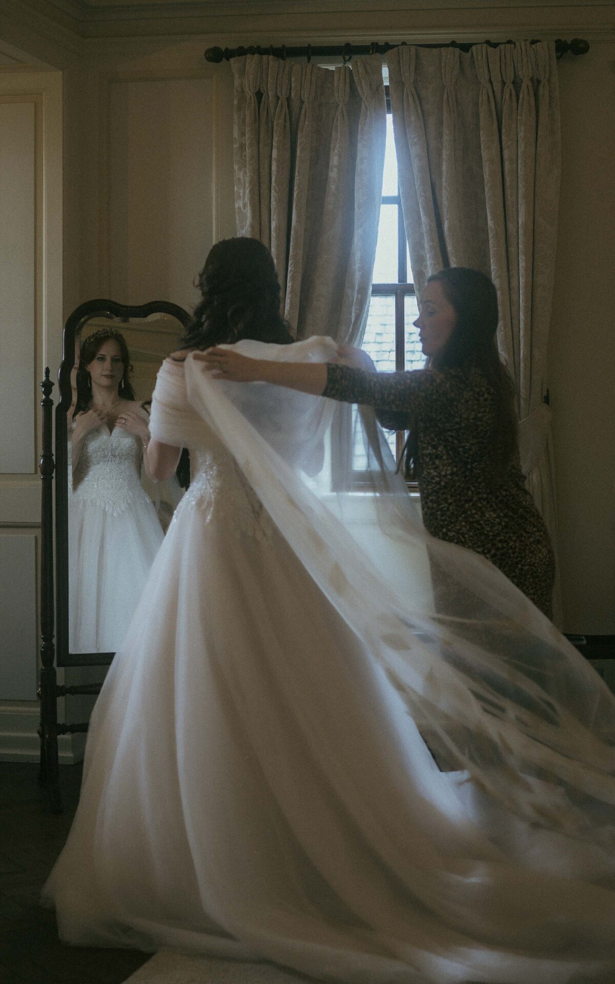 Elegant and emotional moments captured during bride preparation, showcasing the details of her dress, bouquet, and personal touches as she gets ready for her special day