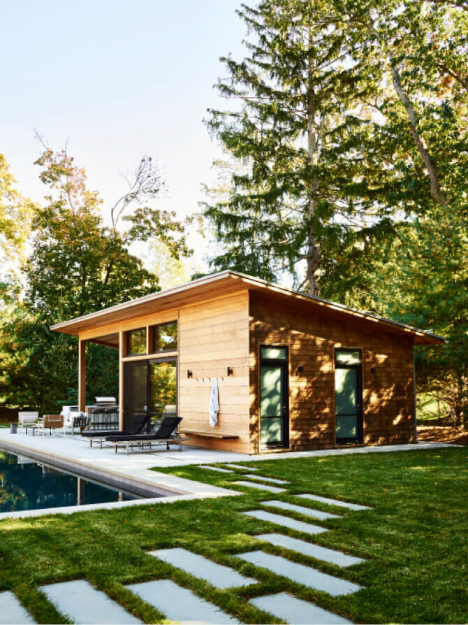 New construction home design in Hingham, Massachusetts, features modern outdoor furniture and details by top designers in Hingham, creating a stylish retreat.
