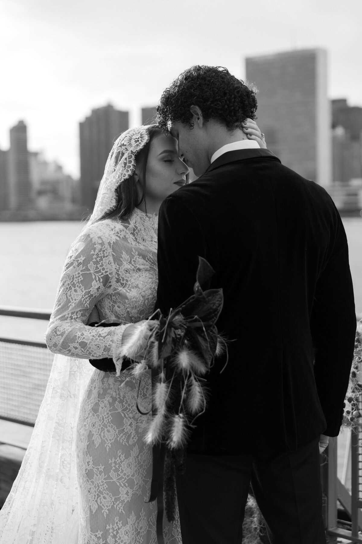 meredith-michel-editorial-wedding-bw-intimate-moment-city-backdrop