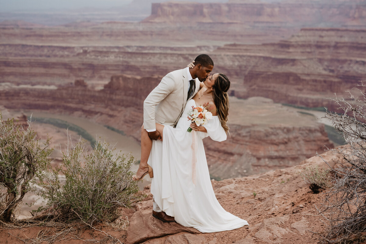Utah Elopement Photographer captures couple embracing during outdoor portraits