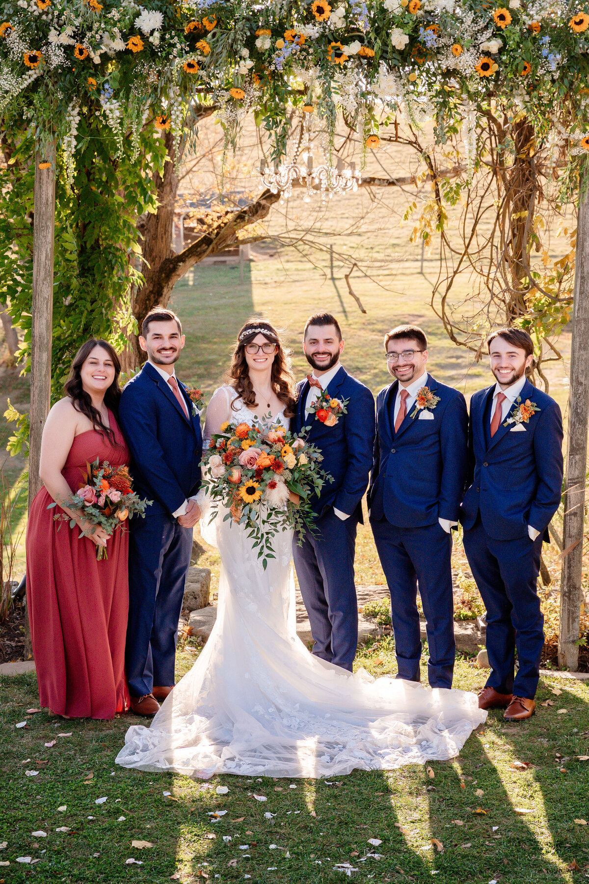 wedding party posing for formal wedding photo