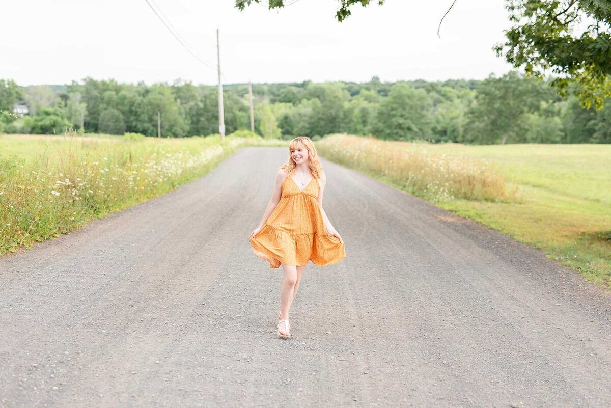 High School Girl Running in Field