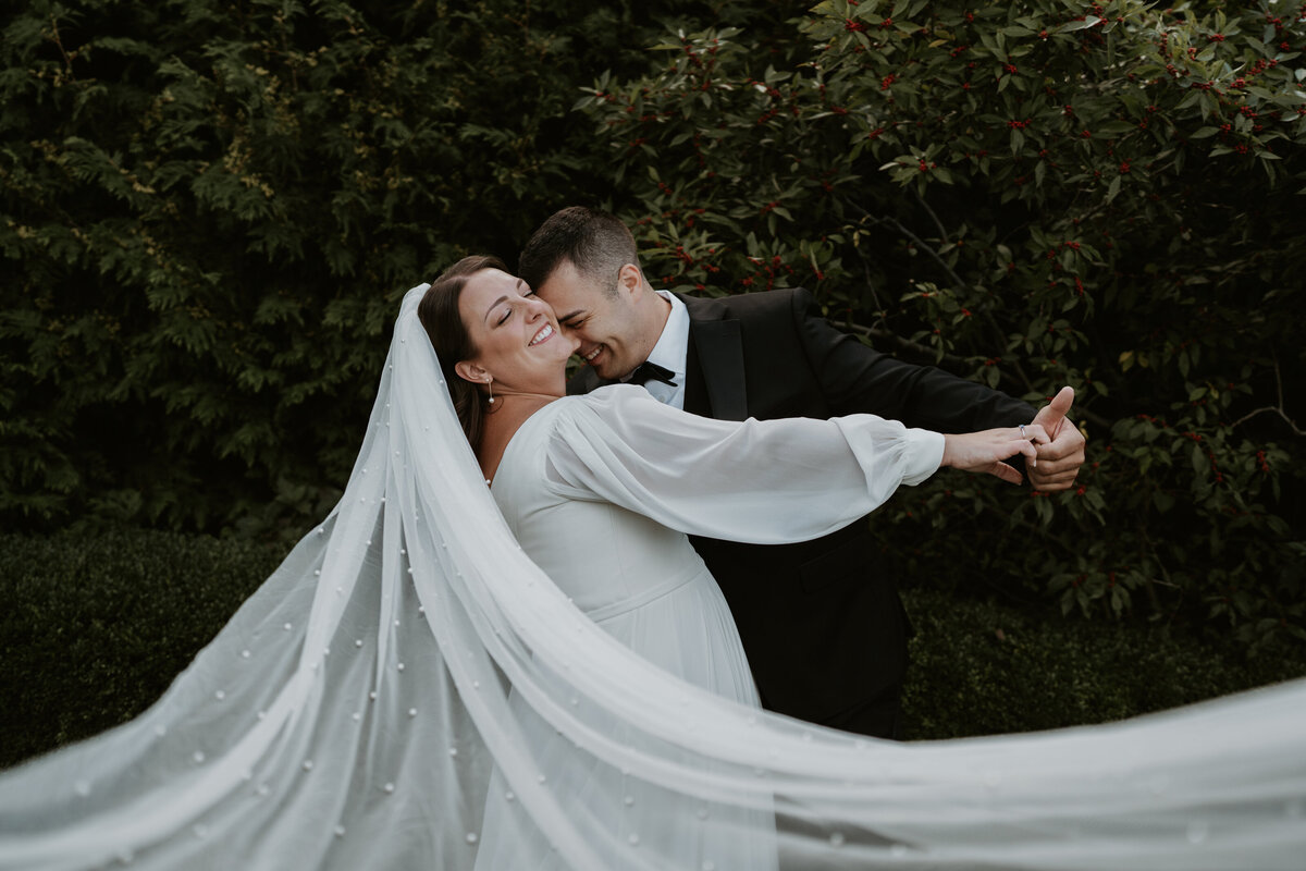 bride & groom smiling