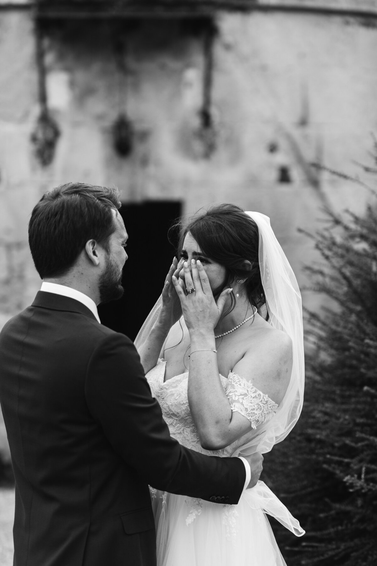 candid moment of crying bride during the wedding ceremony in France