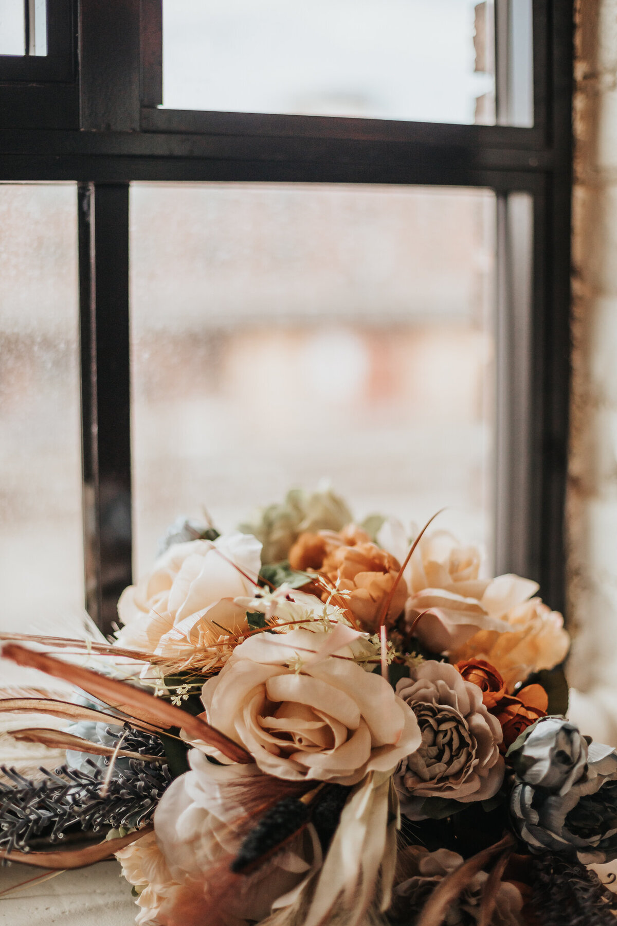 Rustic boquet in window detail shot