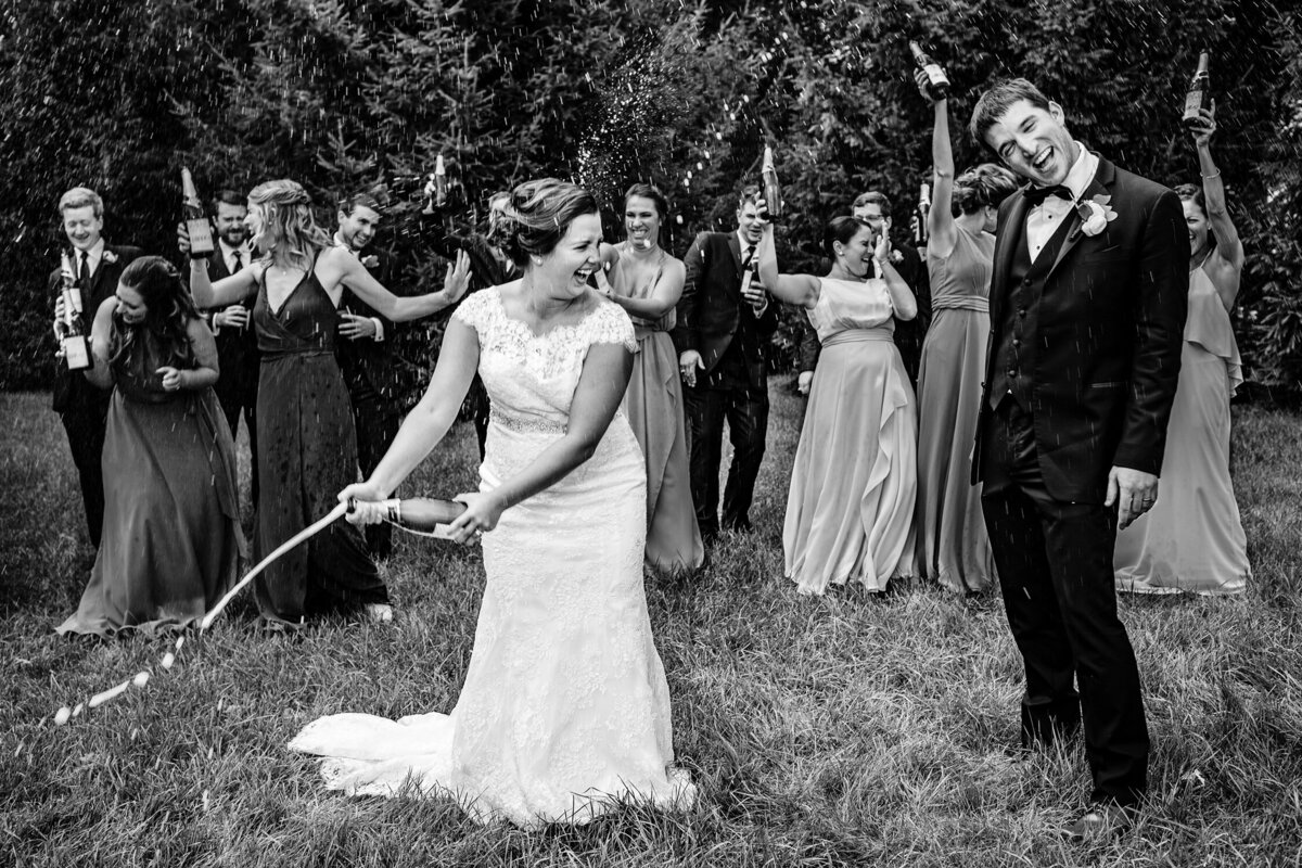 A couple is showered in champagne during their Notre Dame wedding.