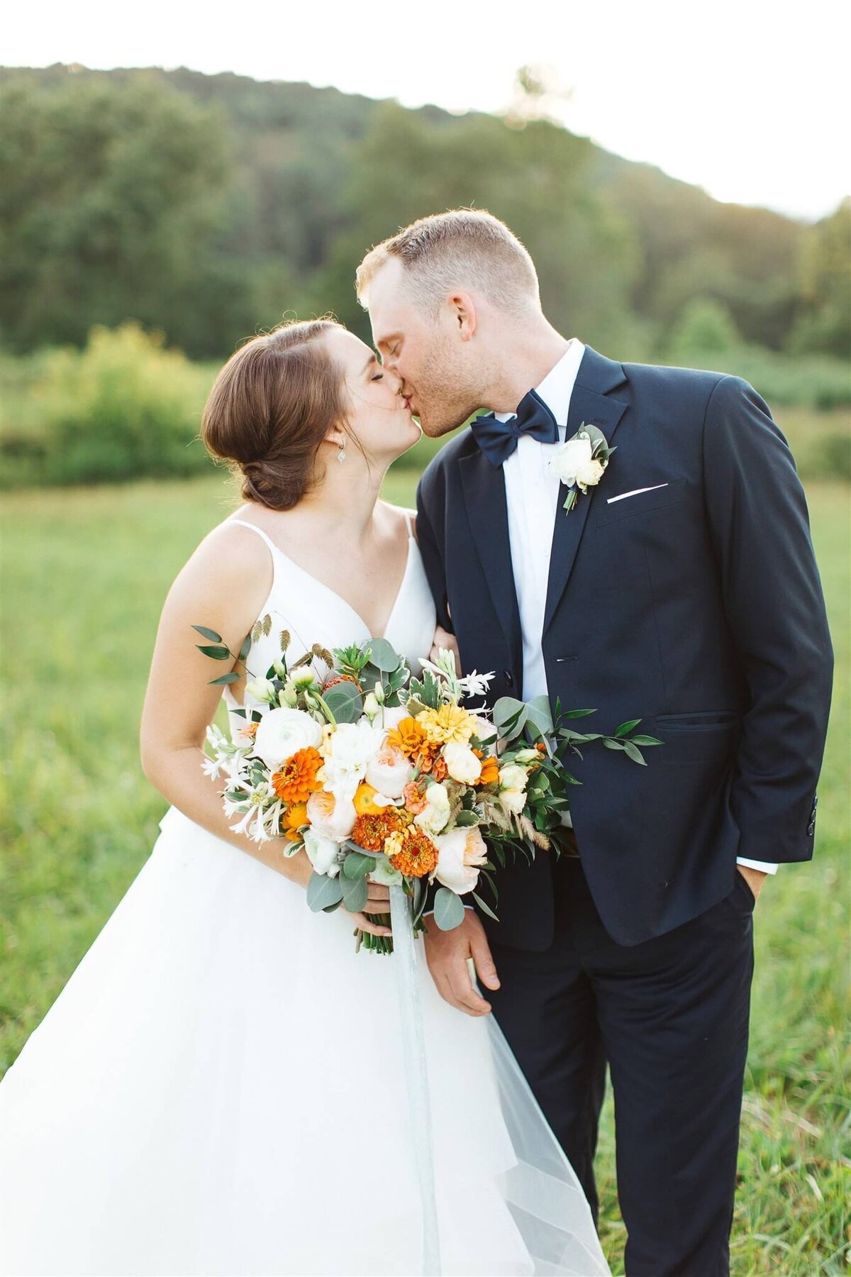 Kalynne Miller Wedding - bride and groom kissin