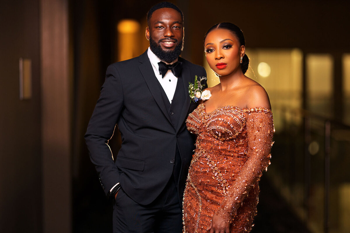 Tomi and Tolu Oruka Events Ziggy on the Lens photographer Wedding event planners Toronto planner African Nigerian Eyitayo Dada Dara Ayoola ottawa convention and event centre pocket flowers Navy blue groom suit ball gown black bride classy  80