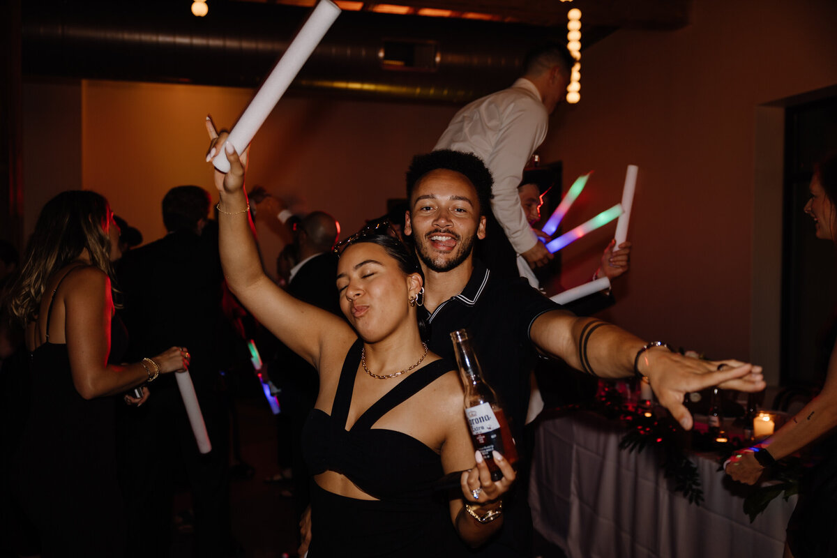 Wedding guests dancing at a reception