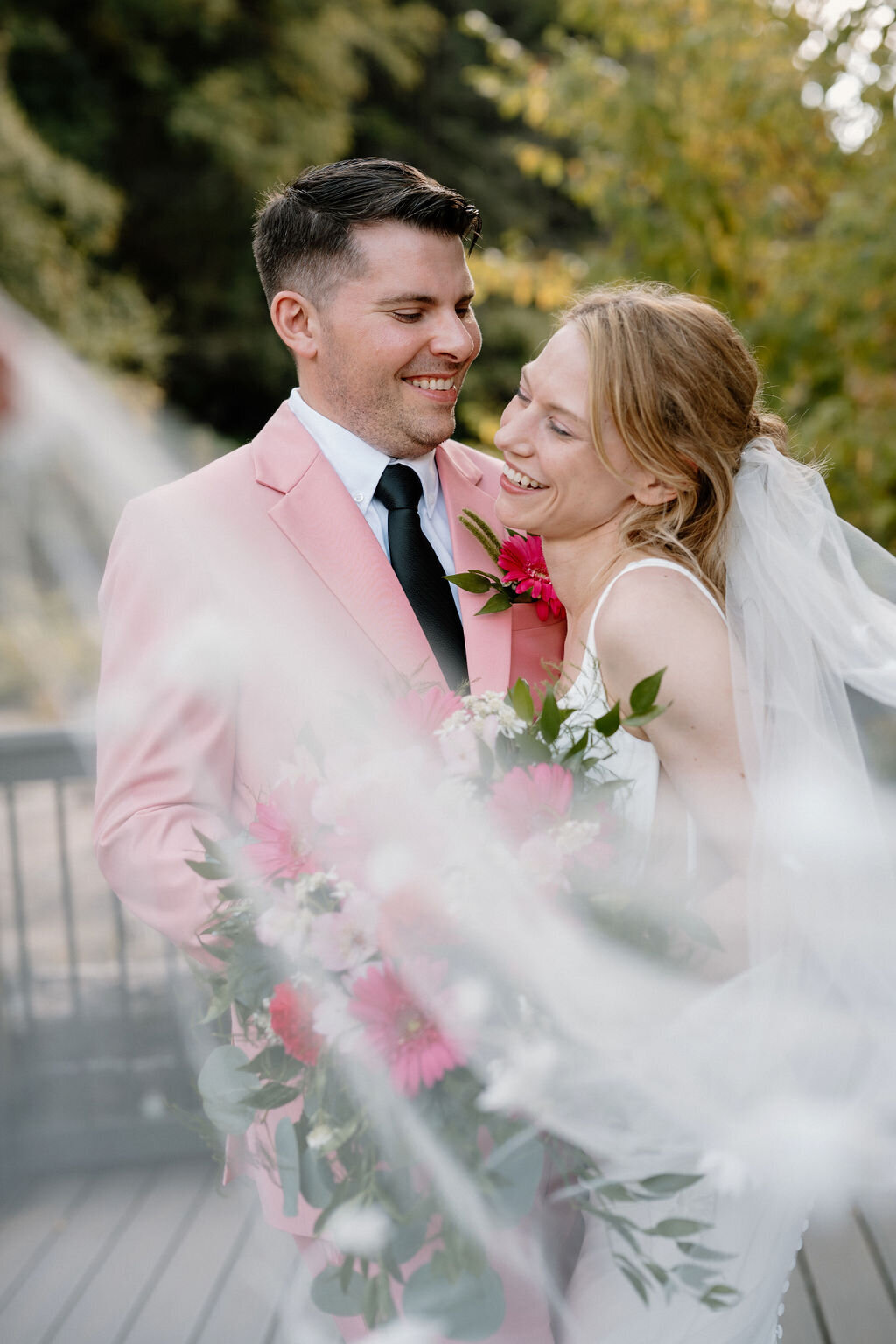 Candid wedding day couple portraits outdoors, captured by NYC wedding and elopement photographer Dom Augustine.
