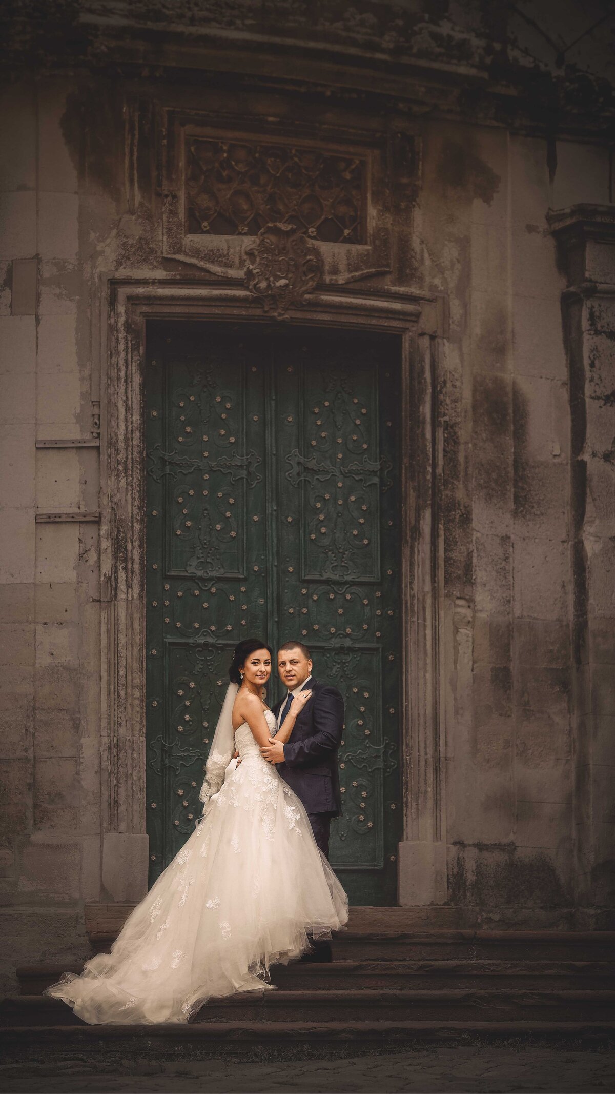 Bride and Grom infront of building