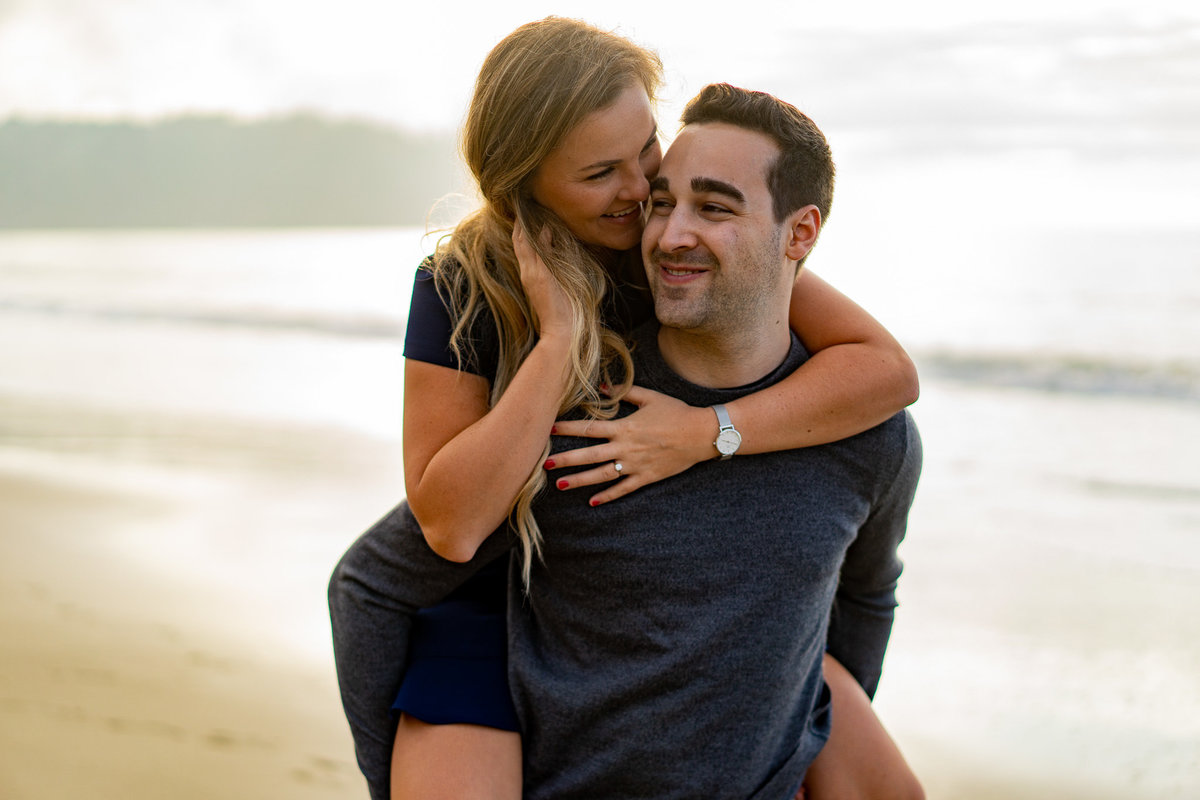 couple laughing at Baker Beach