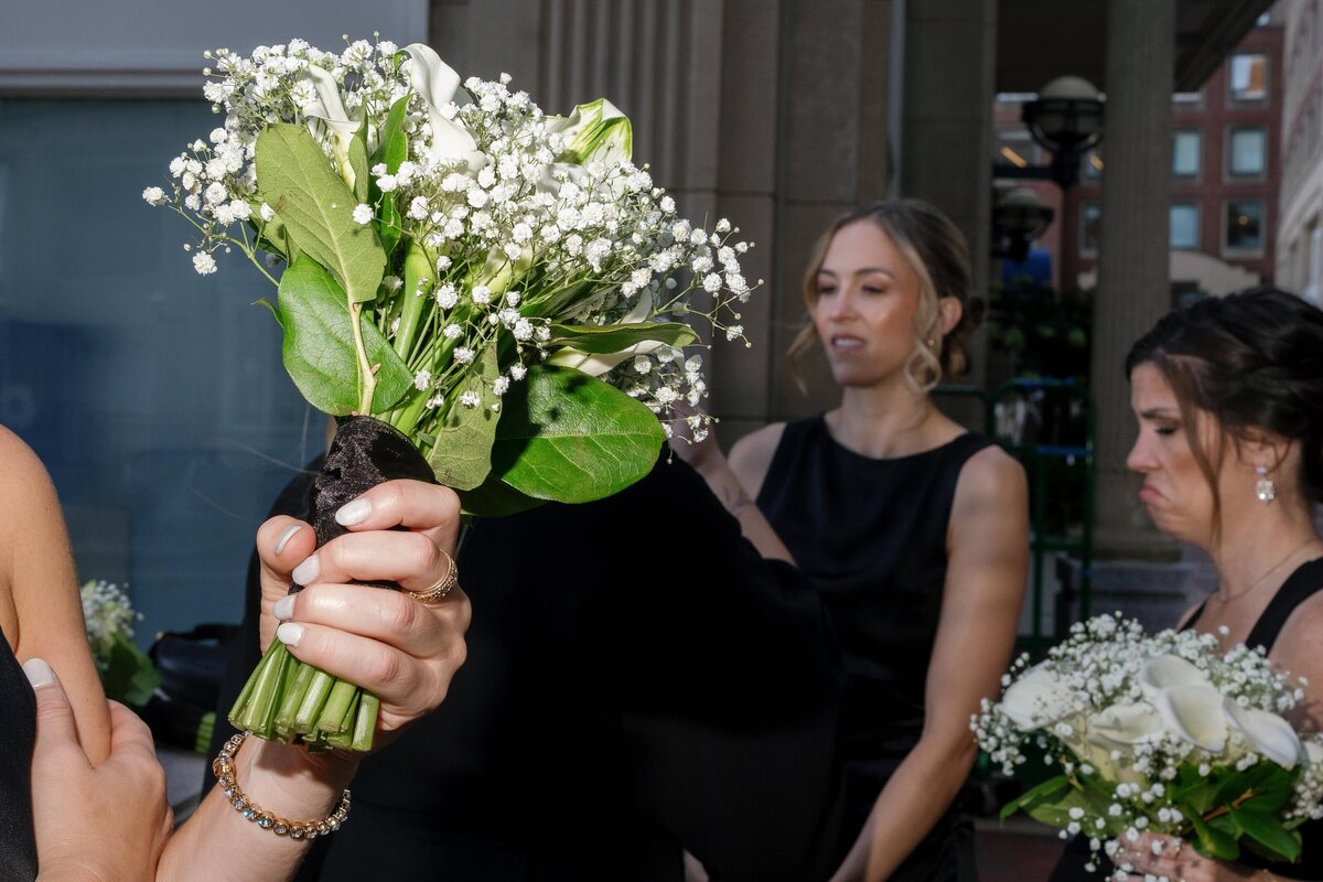 wedding-bridesmaid-holding-boquet-street-photograph