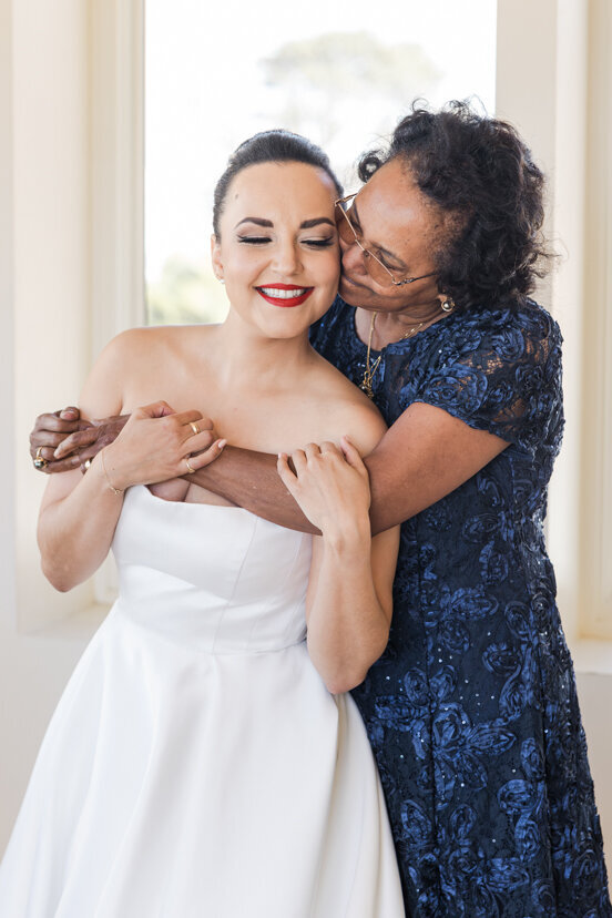 mother-hugging-bride
