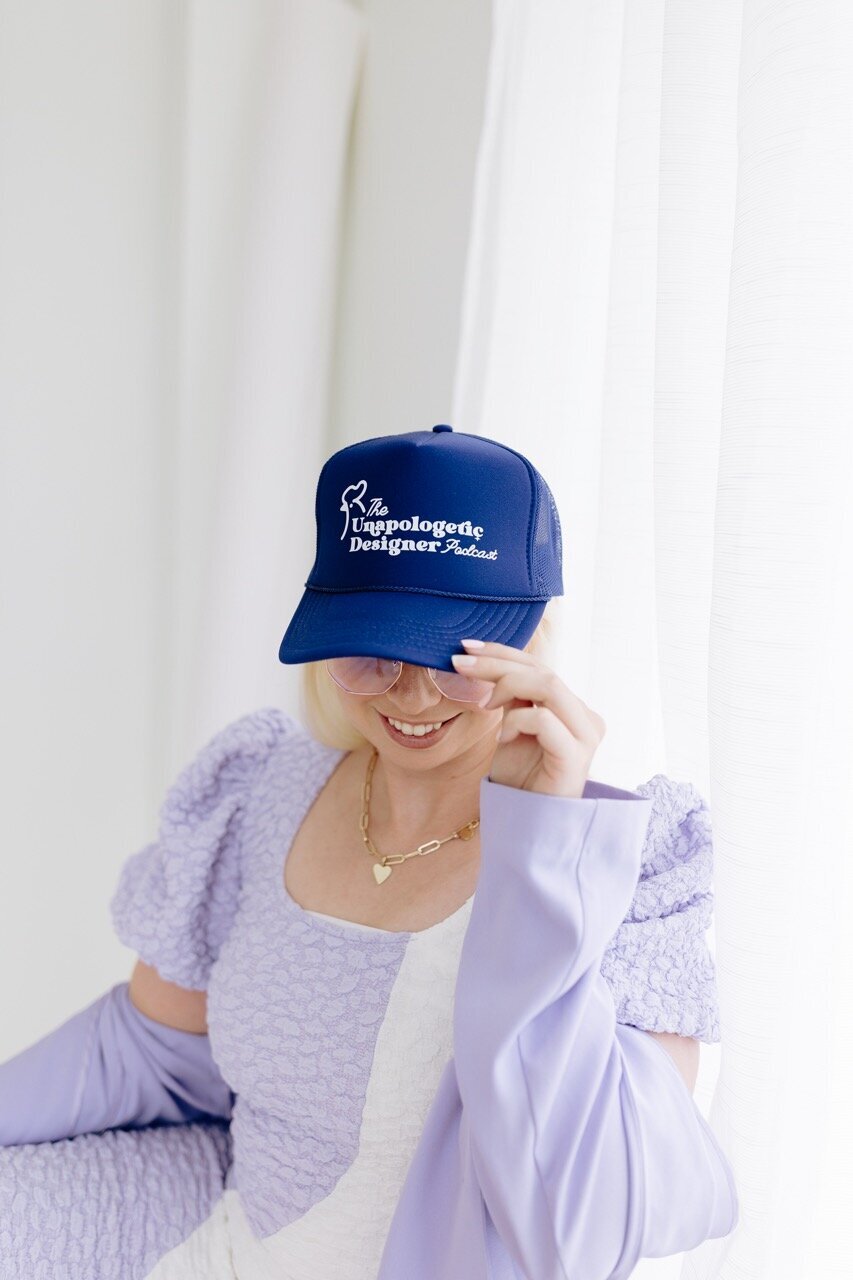 podcast host with hat