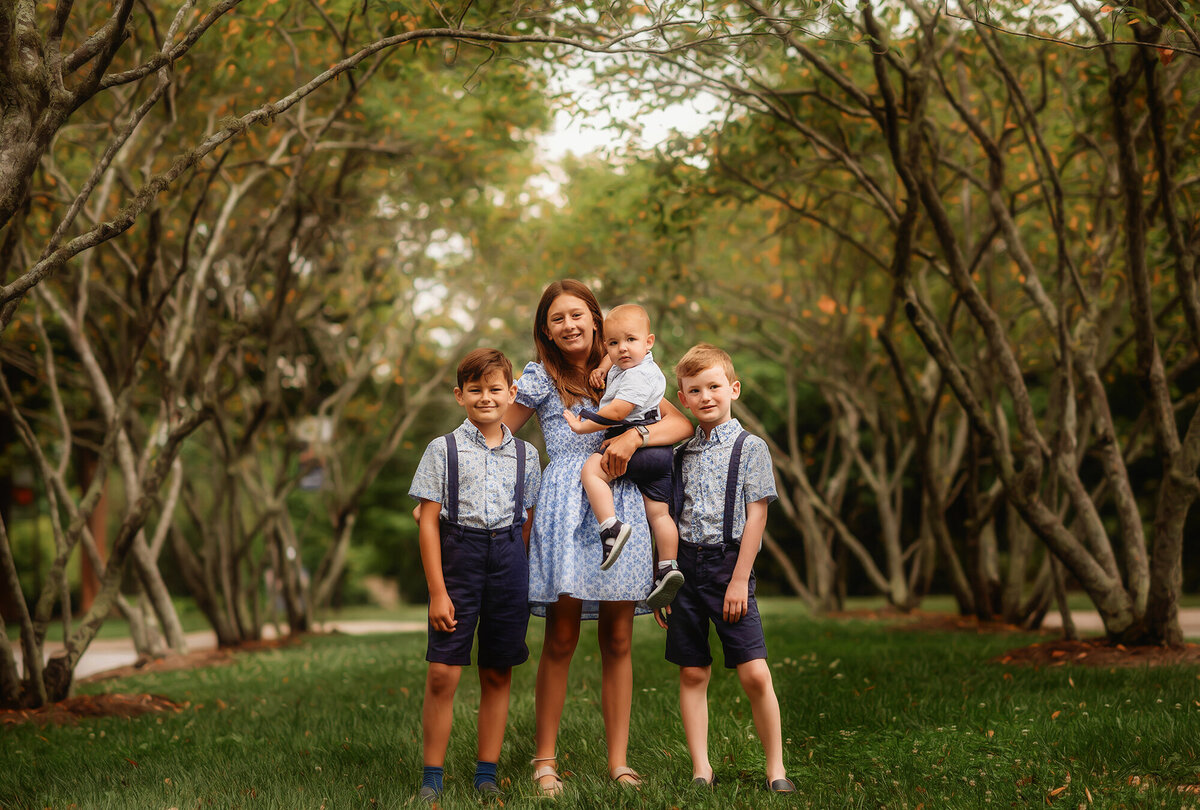 Children pose together during Family Pictures at the NC Arboretum  in Asheville, NC.