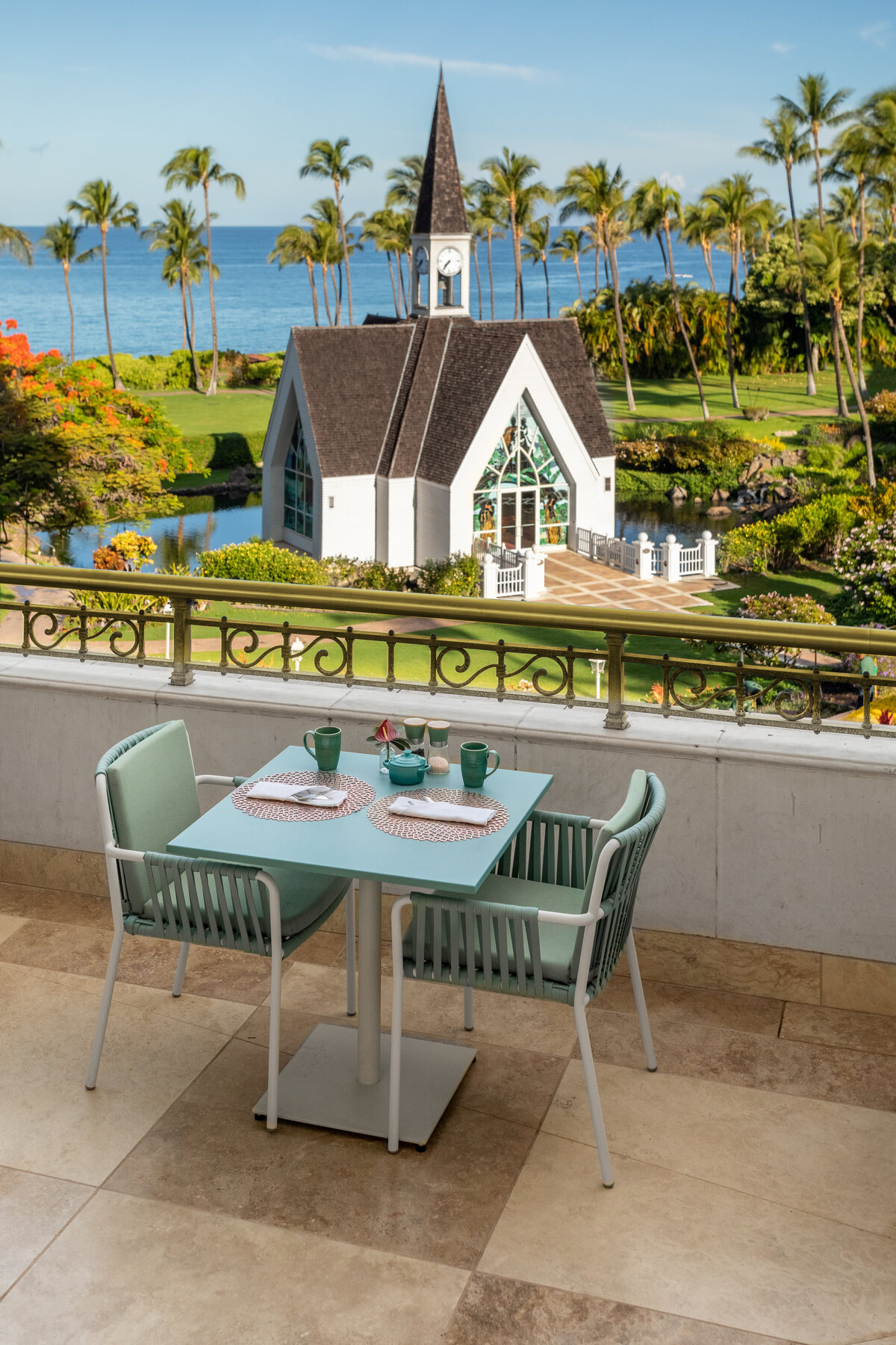 A table for two at the 'Ikena Restaurant overlooking the Grand Wailea's chapel and the Pacific Ocean. 