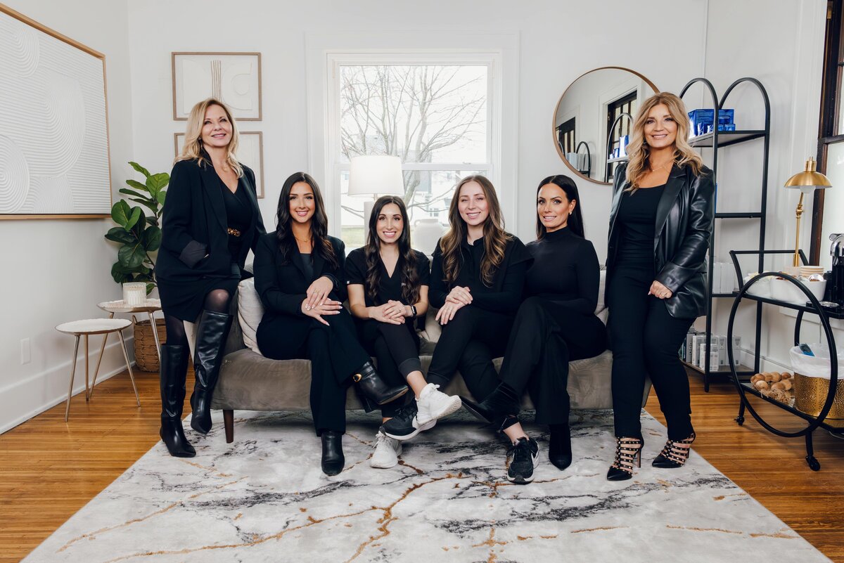 A med spa team photographed by Luma Media in their office