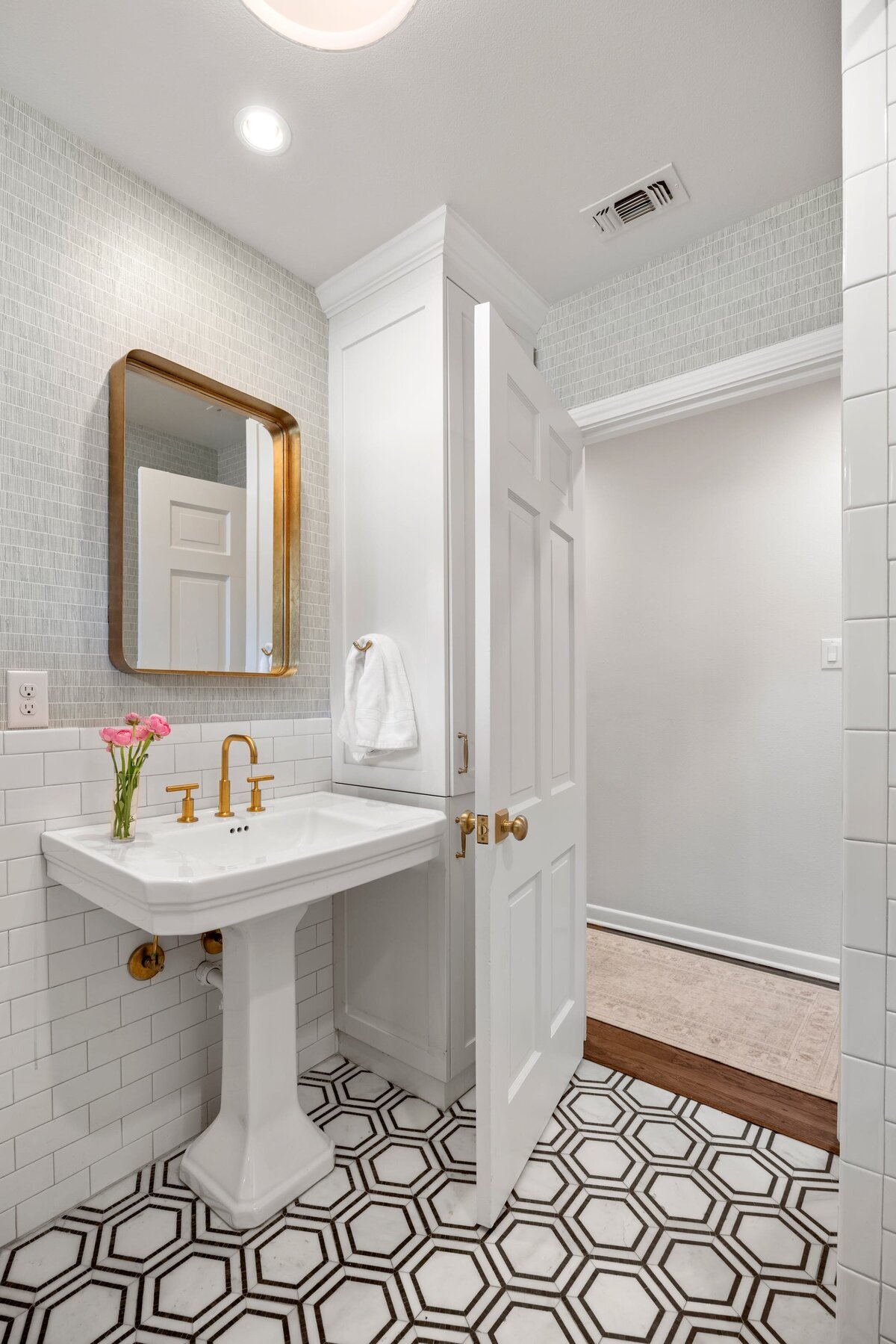 the keeping room interiors oakview guest bath with black and white flooring