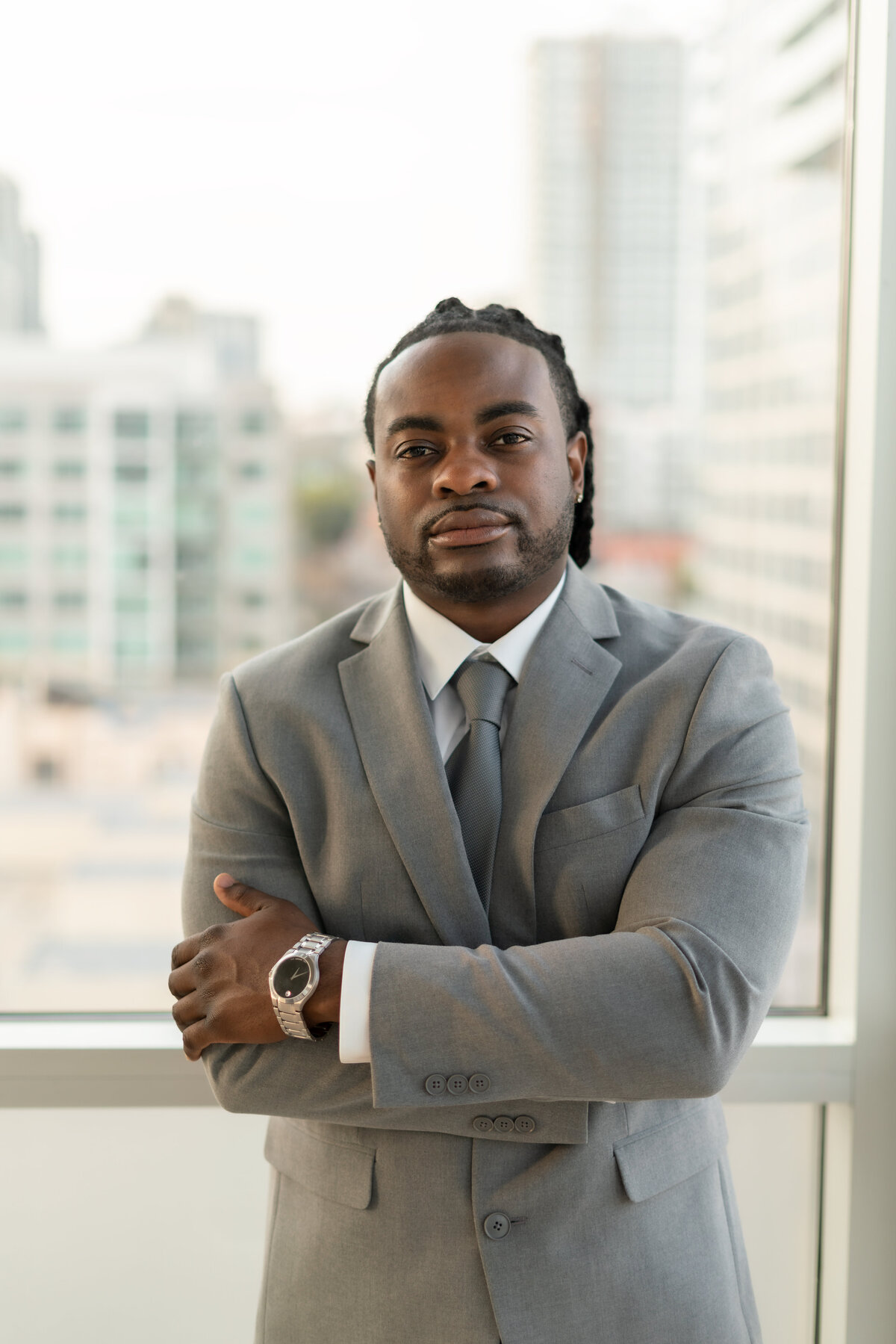 Black male real estate agent in gray suit