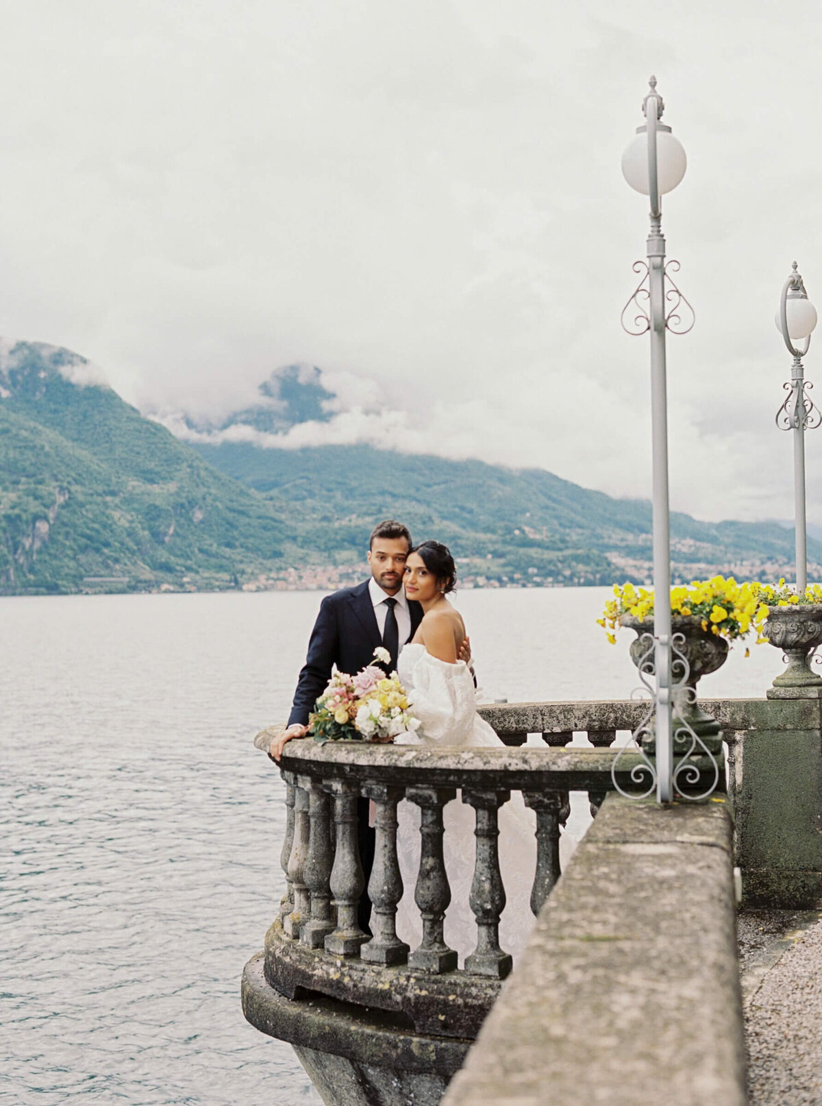 A wedding day photo of the bride and groom at Villa Aura del Lago on Lake Como in Italy