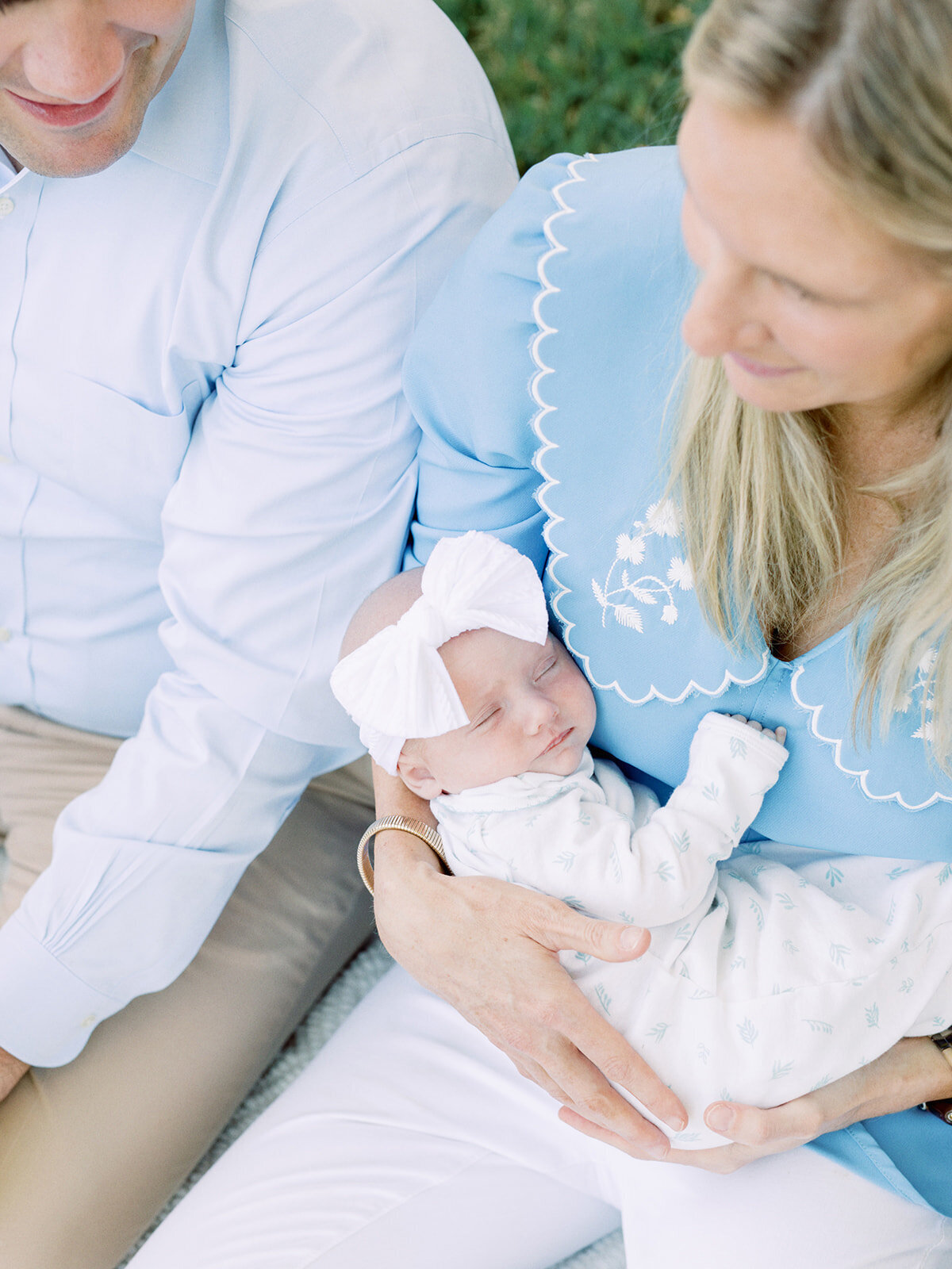 A baby held by a mother during a Richmond family photography session by Katie Stansfield Photography.