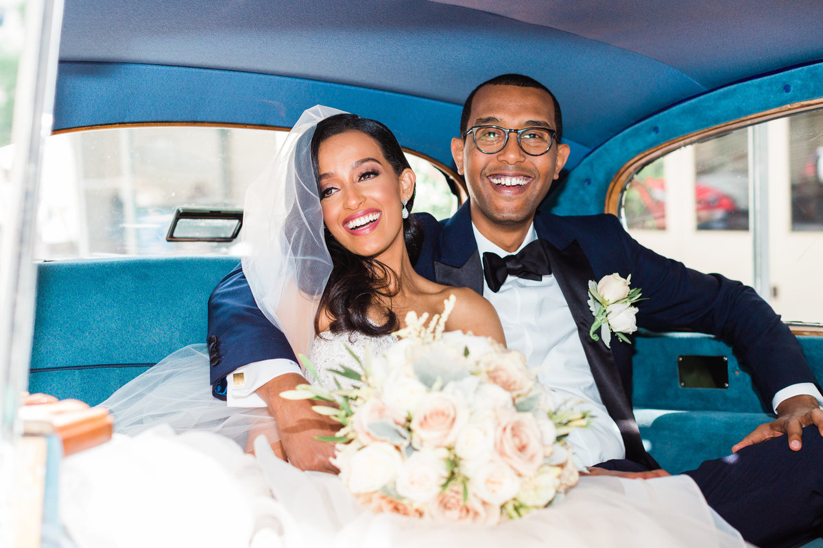 Bride and Groom in Rolls Royce