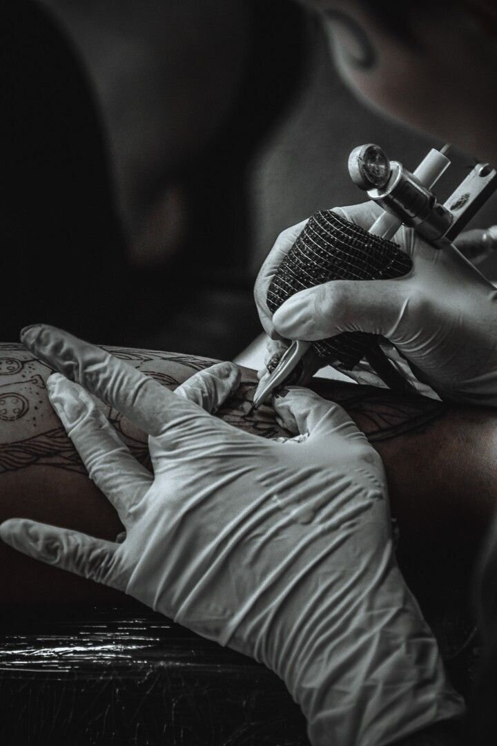 Close-up of a tattoo needle in action at Tattoo Studio